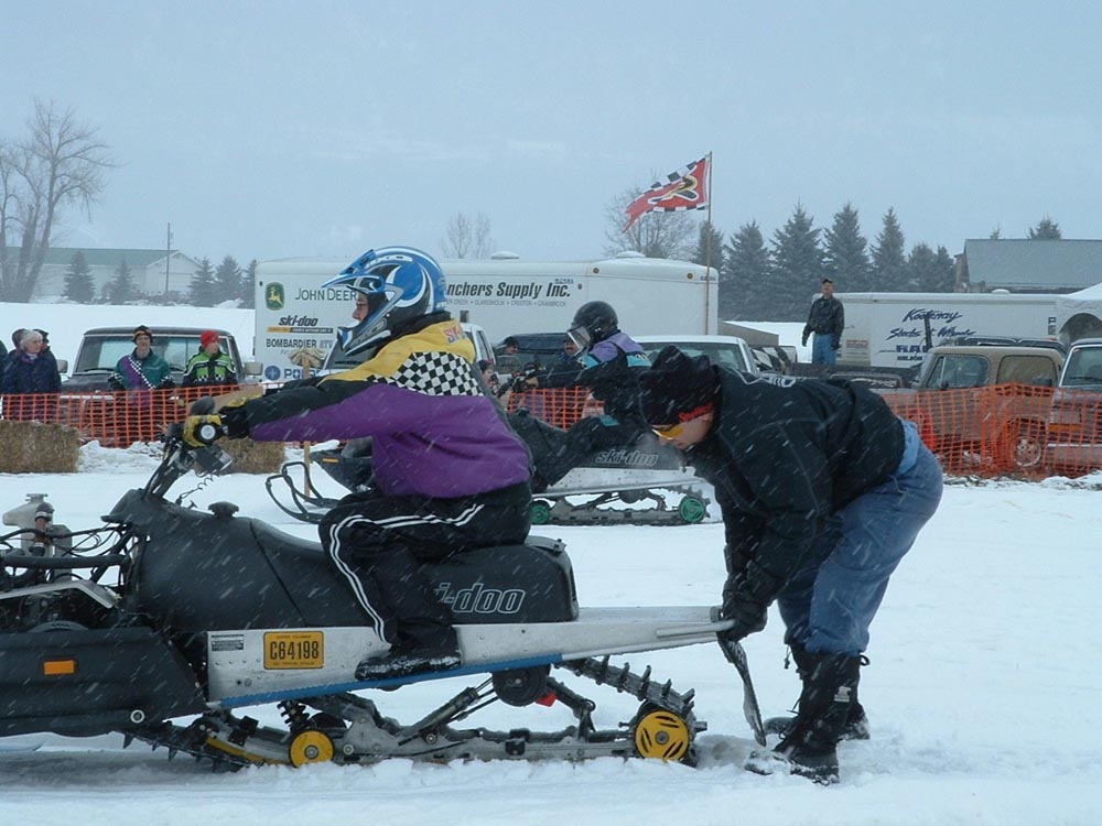 Hi-Torque Rollers Racing Action - An exciting image featuring Josh & Dan in a thrilling race with Hi-Torque Rollers on the Ski-Doo snowmobile secondary CVT clutch.